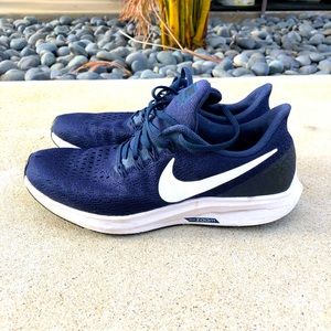 Women’s navy blue Nike running sneakers